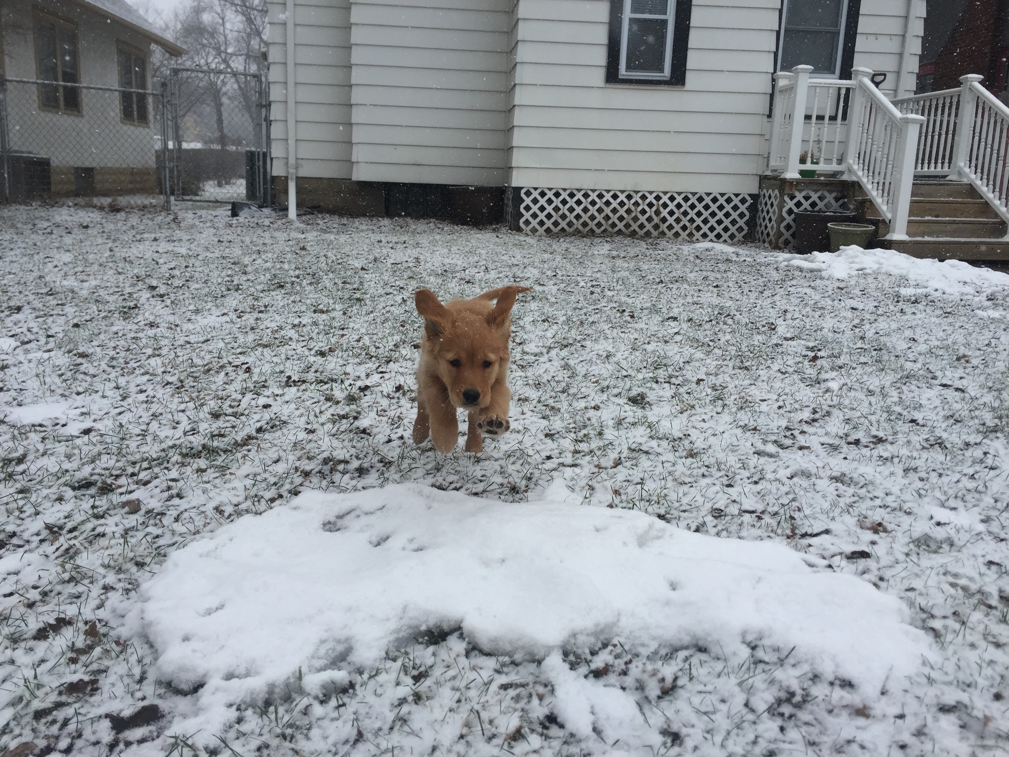 Chloe jumping over snow in a similar manner to supergirl